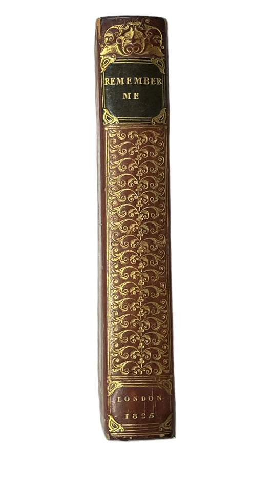 Spine of Remember Me! (1825), with gold-colored scrollwork, a dark title label and London 1825 lettering near the foot.