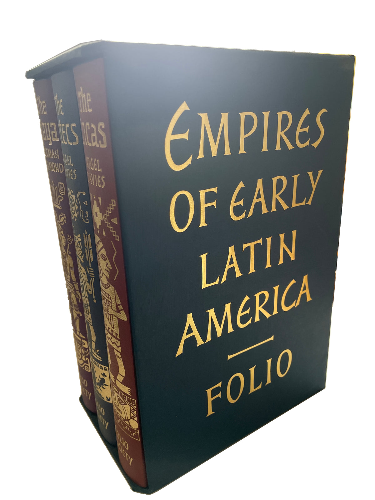 Angled view of the Empires of Early Latin America slipcase, with gold title lettering beside the decorated spines of The Maya, The Aztecs and The Incas.