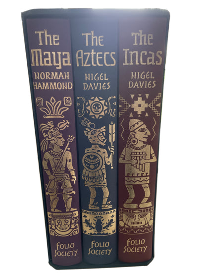 Spines of The Maya, The Aztecs and The Incas in their slipcase, with gold titles and illustrated figures on purple, blue and reddish-brown cloth.