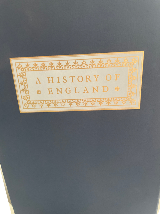 Close-up of the pale, gold-bordered A History of England label on the dark-blue slipcase.